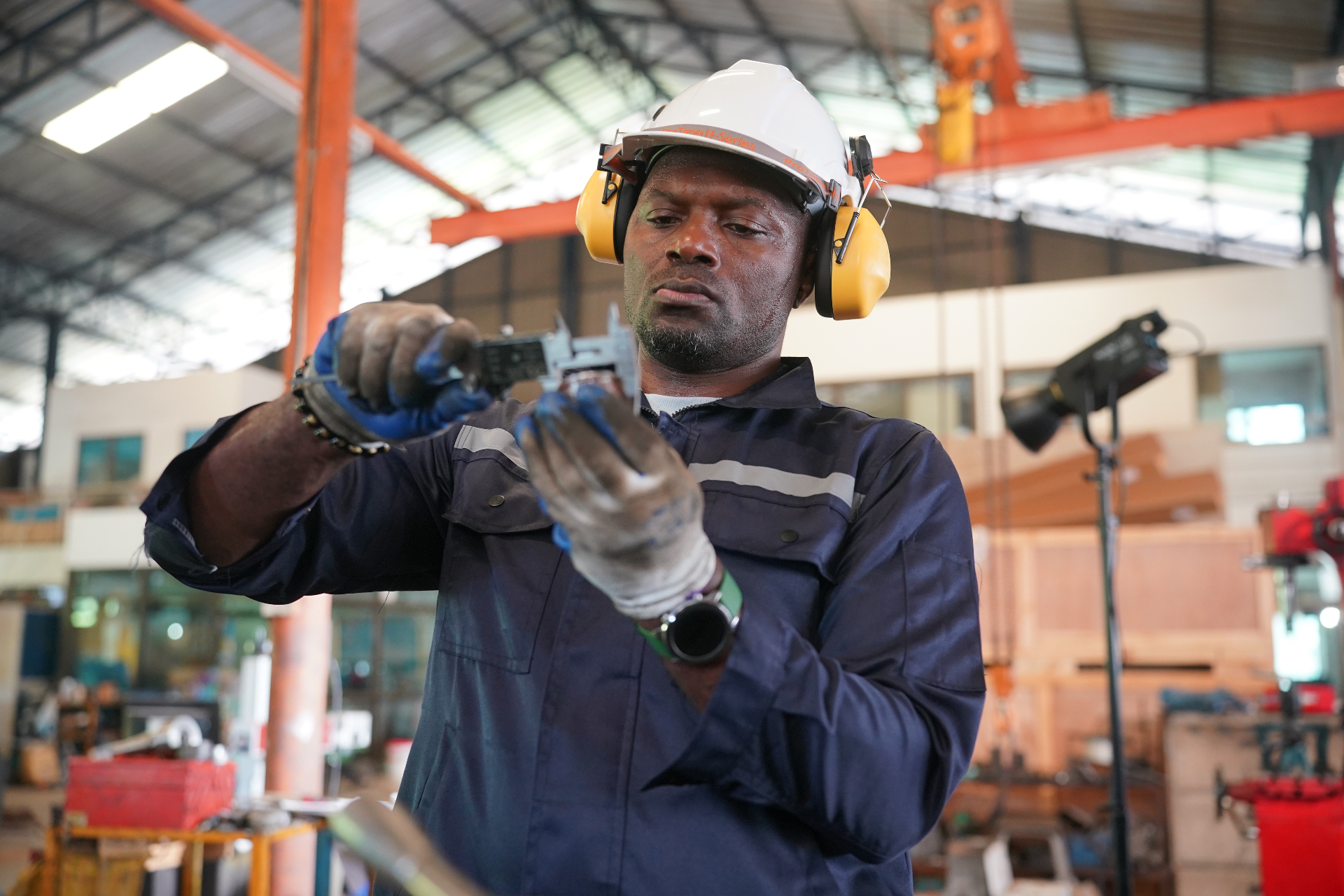 Professional heavy industry worker at factory